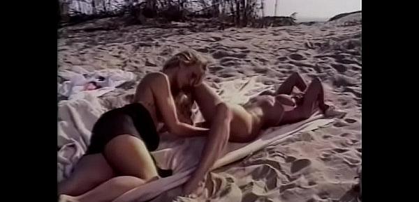  two blondes with great bodies are fucking sensually on the beach